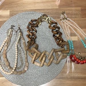 Noonday brand wooden necklace plus two target necklaces
